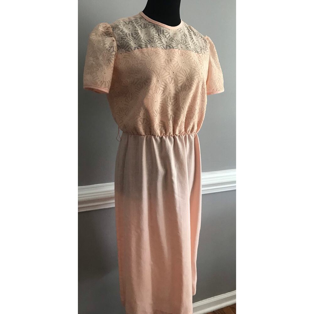 Pink 1960s tea length dress with floral laced bodice